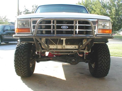 1996 Ford Bronco - Front view of a 1996 Ford Bronco a custom tubular front bumper and off-road tires.