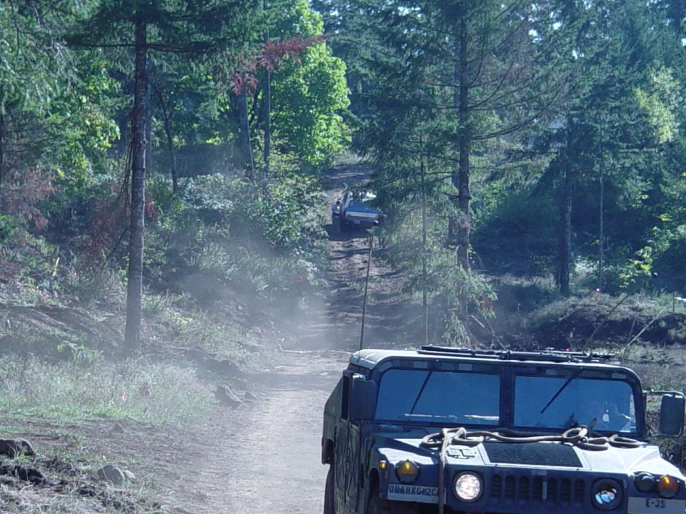 Walking back to check out the hole after the hummer pulls us out