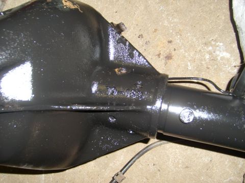1994 Ford Bronco - Close-up of a painted rear axle housing showing casting numbers.