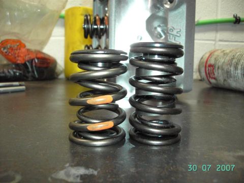 1984 Ford LTD Crown Victoria - new roller spring on the left, standard AFR spring on the right.