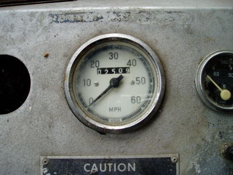 2000 Ford E350 - Close-up of a vehicle's dashboard showing a speedometer and a fuel gauge.