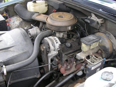 1994 Ford Probe - The engine bay of a vehicle, showing the V8 engine components and associated plumbing.