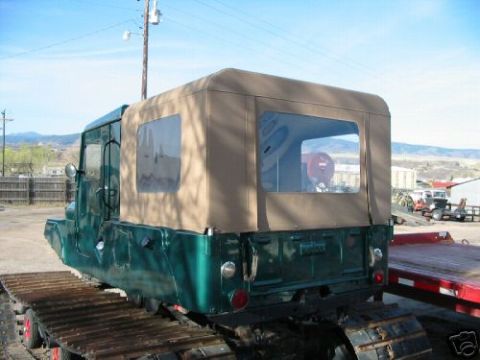 2000 Ford E350 - This tracked vehicle does not appear to be a 2000 Ford E350.