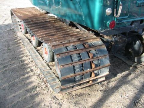 2000 Ford E350 - This vehicle features a unique tracked system for traversing difficult terrain.