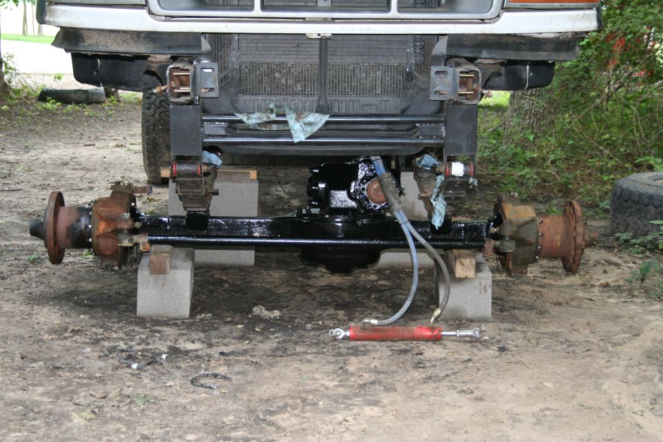Front mounted, knuckles unpainted, no brakes.