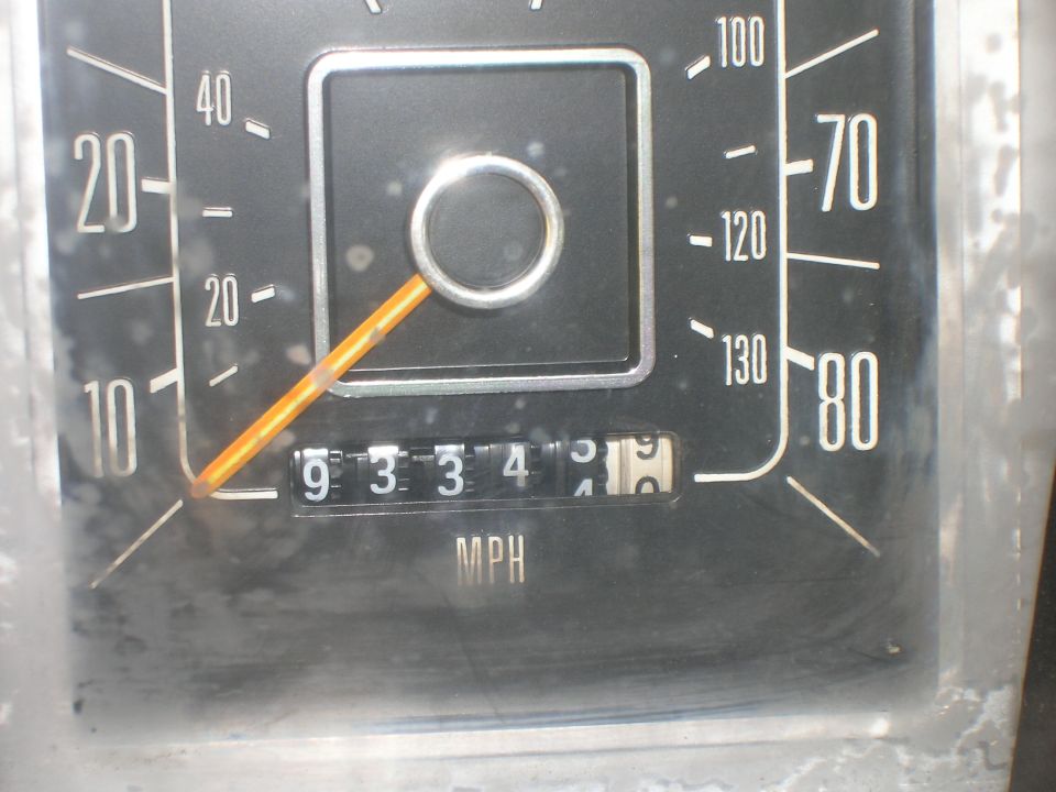 Speedometer and odometer showing 93334 miles