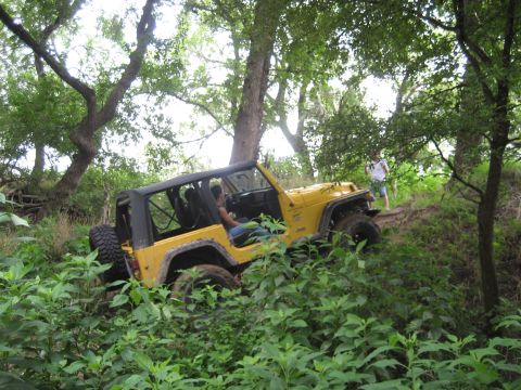 1986 Ford Bronco - Tommy tring to get up a really slick hill...no luck