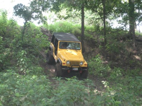 1986 Ford Bronco - Tommy coming down another hill