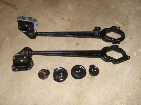 1994 Ford Bronco - These appear to be axle components, possibly for a Ford Bronco, laid out on a concrete floor.