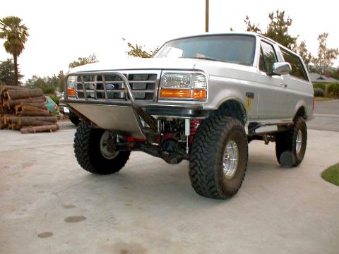 1996 Ford Bronco - This lifted 1996 Ford Bronco features a custom front bumper and off-road tires.