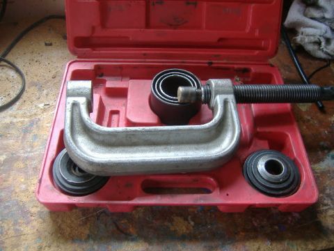 1989 Ford Bronco - Go get this tool. Why? Because it should be a free loaner from your local parts store. The threaded end drives down on the top cup, pushing…