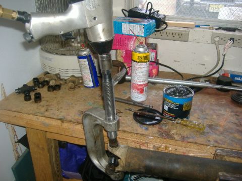 1989 Ford Bronco - The ball joint tool in action. Mine came with a manual that had a pic of a guy hold the driveshaft in one hand and a ratchet on top of the…
