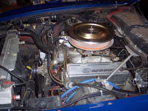1971 Ford Mustang - Engine bay view with Ford Motorsport valve covers and air intake system.