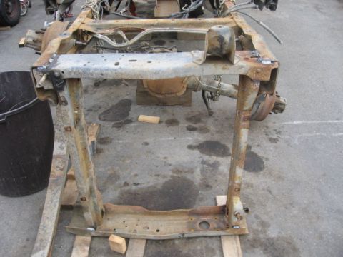 1990 Ford F-250 - This heavily rusted truck frame is missing its body and drivetrain components.