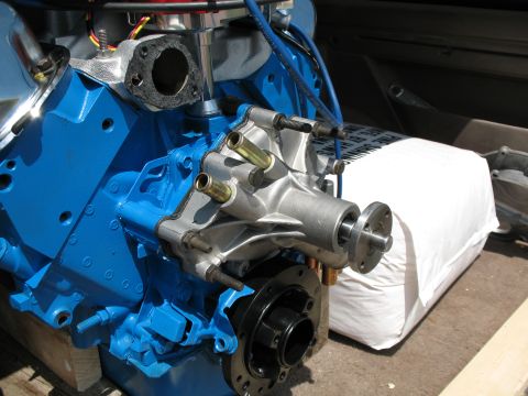 1989 Ford Bronco - Engine water pump and block assembly, likely for a Ford vehicle.