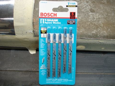 1996 Ford Bronco - A package of Bosch T-shank jigsaw blades is shown, designed for thin metal and smooth cuts.