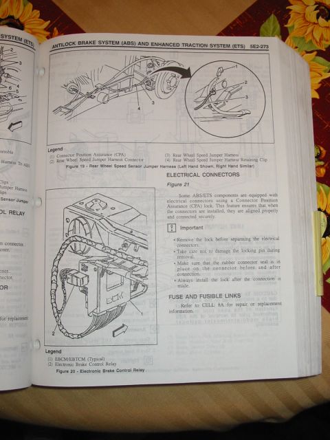 1997 Pontiac Grand Prix - Service manual page detailing the Antilock Brake System (ABS) and Enhanced Traction System (ETS).