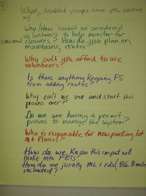 1986 Ford Bronco - Handwritten notes on a yellow pad contain questions about volunteers, routes, and responsibilities.