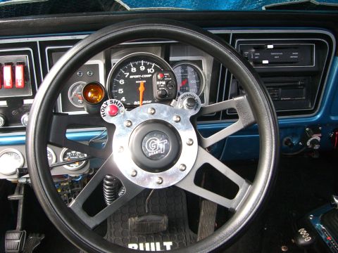 1977 Ford F-150 - Auto meter fuel level and speedo installed in gauge pod with LEDs for turn signal and high beam. Monster tach on steering column and custom…