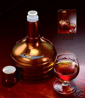 1996 Ford Bronco - Sam Adams copper bottle and glass with amber liquid.