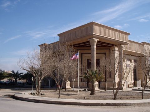 1996 Ford Bronco - Exterior view of a building with ornate columns and an American flag.
