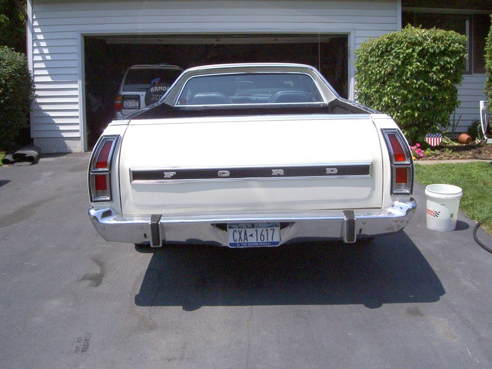 White 1972 Ford Ranchero rear view, black top, chrome bumper, New York license plate CXA-1617