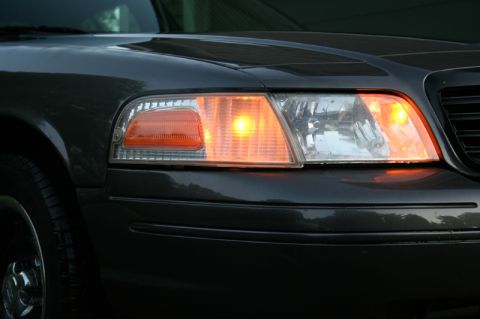 2000 Ford Crown Victoria - Headlight and amber turn signal assembly on the front corner of a 2000 Ford Crown Victoria.