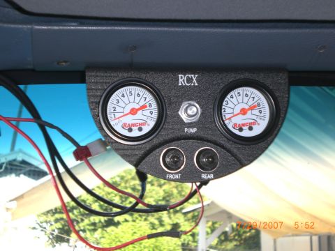 1991 Ford Bronco - Rancho RCX gauge panel for air suspension, showing pressure readings and control switches.
