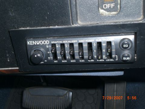 1991 Ford Bronco - Close-up of a Kenwood graphic equalizer installed in a vehicle's dashboard.