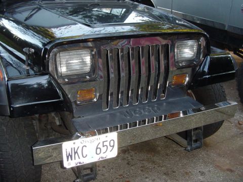 1989 Ford Bronco - It came with this groovy chrome grille cover, headlight and turnlight screens