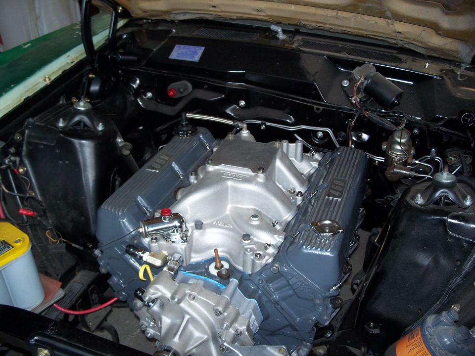 Engine bay of a 1971 Ford Ranchero showing a V8 engine with '460' on valve covers