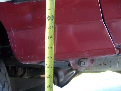 1991 Ford Bronco - Measuring ground clearance on a 1991 Ford Bronco.
