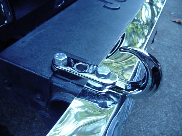 The threaded holes were already in the frame for the hooks