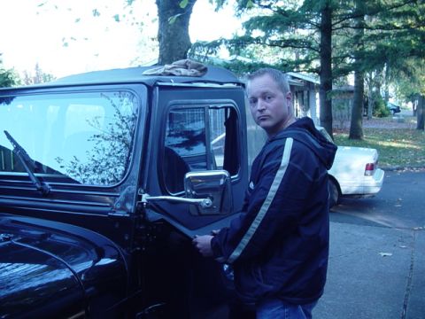 1989 Ford Bronco - Frank putting the top 1/2 of the door back on.