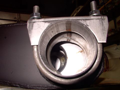 1990 Lincoln Town Car - As you can see, the 2 3/4" clamps are none too big even before the tailpipe slides over this muffler stub.
