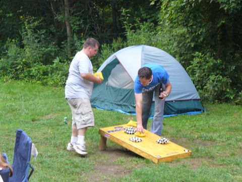1991 Ford Probe - Camping trip with friends includes a game of cornhole.