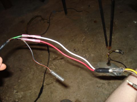 1967 Ford F-250 - A close-up view of a vehicle's wiring harness, showing several wires and connectors.