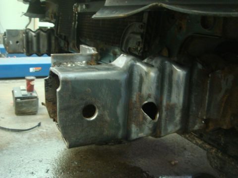 1996 Ford Bronco - Welded metal frame part with holes, possibly from a vehicle's chassis.