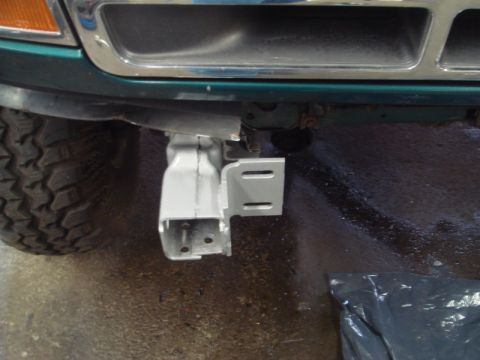 1996 Ford Bronco - Custom winch mount bracket installation in progress on a vehicle.