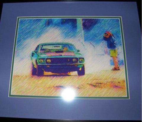 1969 Ford Mustang - Artwork depicts a 1969 Ford Mustang Mach 1 in motion, with a photographer nearby.