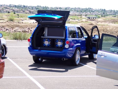 1972 Ford Ranchero - This SUV has been modified with a large screen TV and speakers installed in the cargo area.
