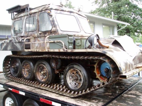 2000 Ford E350 - This unusual tracked vehicle is loaded onto a trailer for transport.