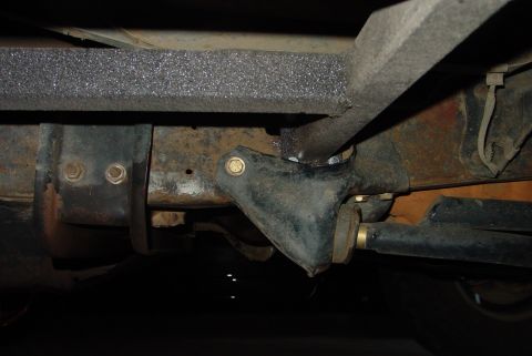 1993 Ford Bronco - Close-up of the undercarriage, showing the frame and slider mounting points.