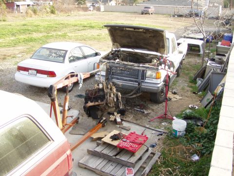 1988 Ford F-250 - Pulling that HEAVY Diesel out , as it was parked in the gravel, took some extra motivation (another vehicle)