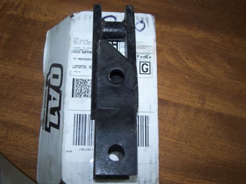 2007 Ford Bronco - An automotive part is shown on top of a shipping box with visible labels and barcodes.
