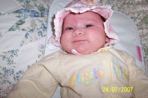 2000 Ford Crown Victoria - A baby is pictured on July 24, 2007, wearing a bonnet and onesie.