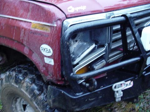 1989 Ford Bronco - Headlight hangin out