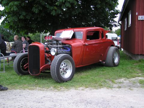 1978 Ford Bronco - Custom hot rod coupe with a supercharged V8 engine and wide rear tires is parked outdoors.