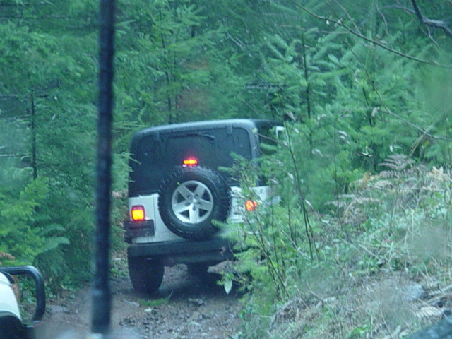 I had to go sit in the truck, it was just raining too much. I didnt see Bernies freind in the blazer go, or Hip either.I did see this Rubicon go by tho
