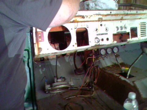 1974 Ford Bronco - Interior view of a vehicle's dashboard area with components disassembled.